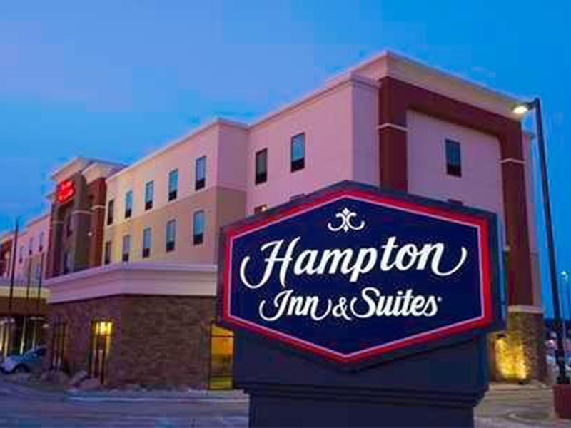 Hampton Inn and Suites in North Dakota - Exterior of Hotel at Dusk